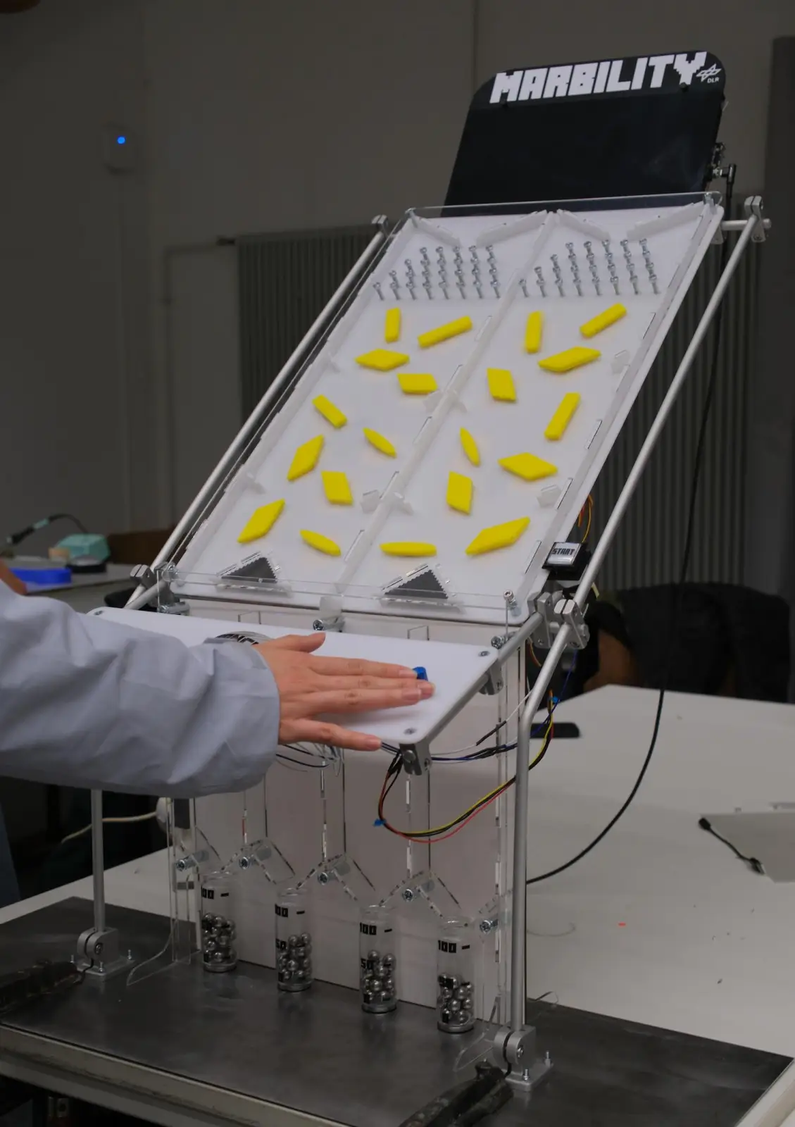 Physical installation of the Chester Choiceworth setup with printer and display