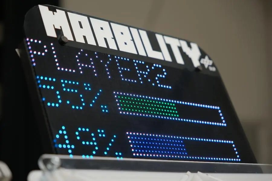 Physical installation of the Chester Choiceworth setup with printer and display